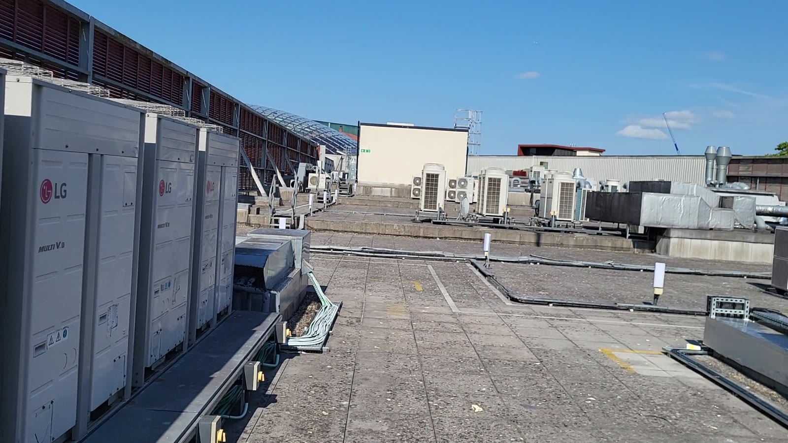 External commercial air conditioning condenser units on a shopping centre roof