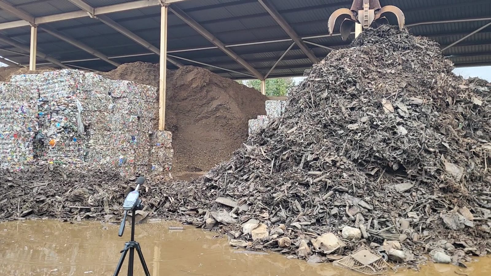 Noise monitoring alongside materials handling at a recycling site