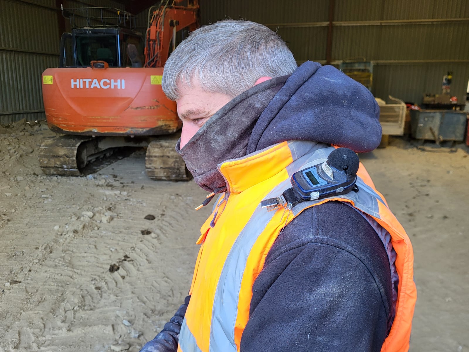 Personal noise monitor worn on a worker’s shoulder